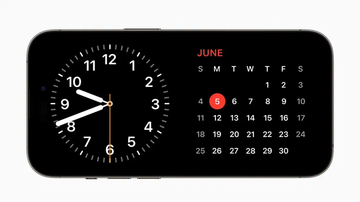 Un smartphone affichant une interface avec un cadran d'horloge indiquant environ 9h40 et un calendrier du mois de juin mettant en évidence le jour 5.